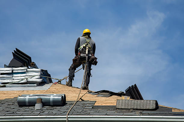 Professional Roofing technician working in North Chili, NY